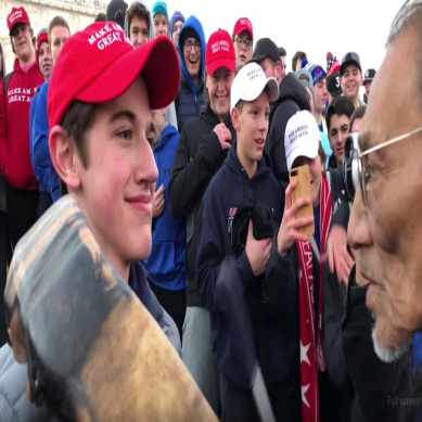 maga hat teen smirking native elder vet